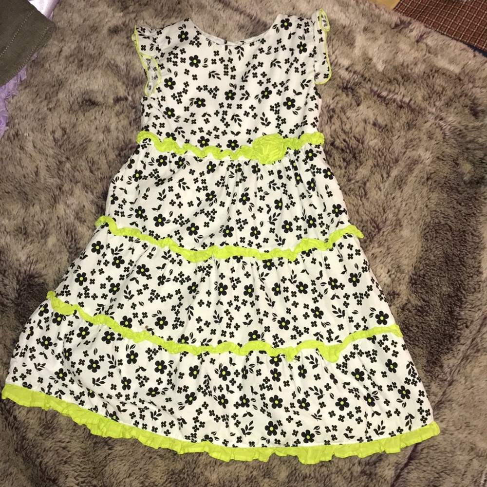 PENNY M. Ruffle shoulder dress.
